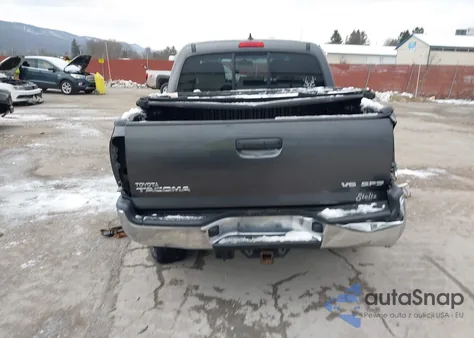 2014 Toyota Tacoma Base V6 z USA, uszkodzony, nr VIN 3TMLU4EN7EM146476